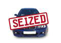 Image of a blue car with the word seized over it