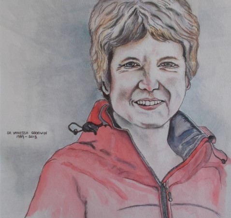Portrait of Dr Vanessa Goodwin wearing a red raincoat