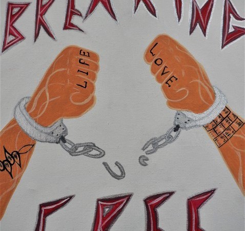 Two handcuffed arms with the handcuff chain broken, surrounded by the words Breaking Free