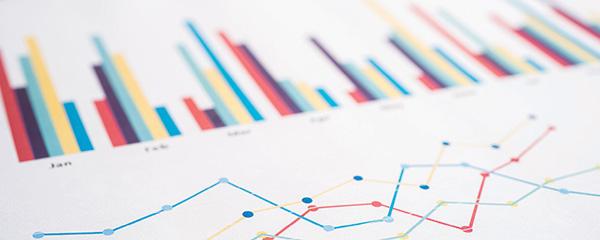 Colourful graphs and charts on white paper