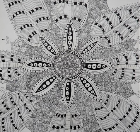 Black and white drawings of feathers radiating out in a circle