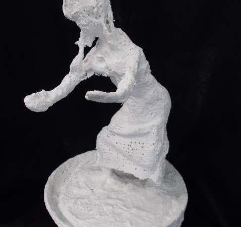 White sculpture of a woman