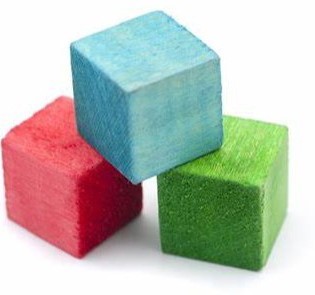 A blue wooden cube sitting on top of a red cube and a green cube